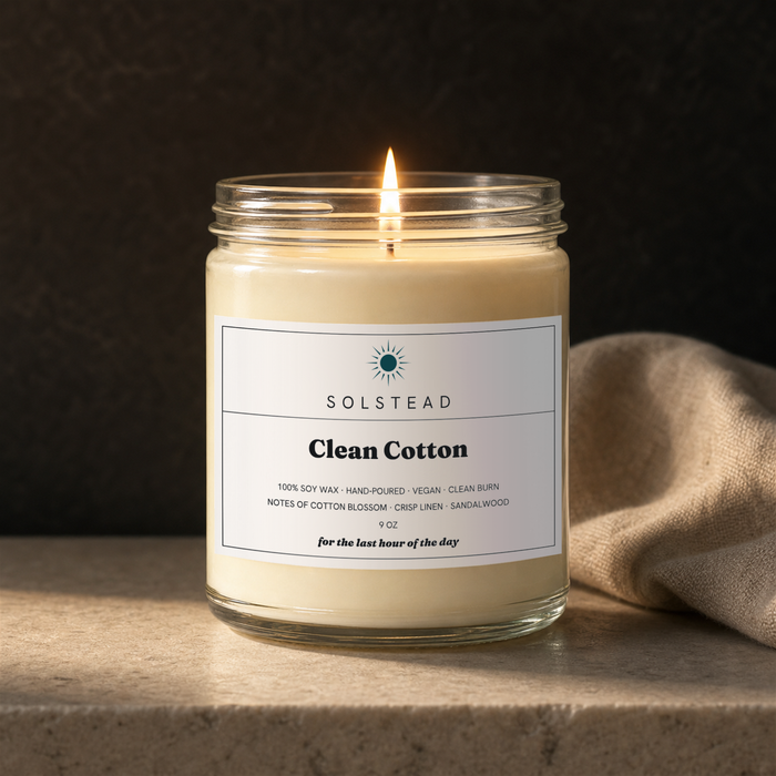 Clean Cotton 9 oz soy candle lit and burning — Solstead